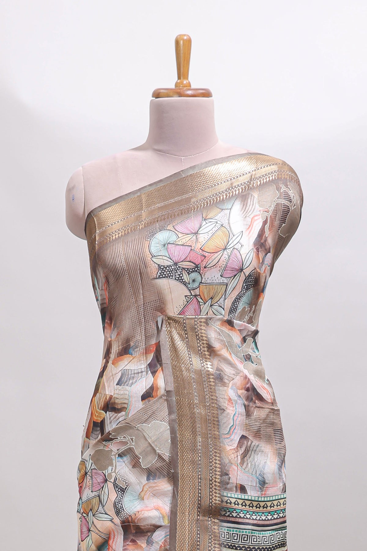 Brown floral design dola silk saree with sellf zari border and matching blouse