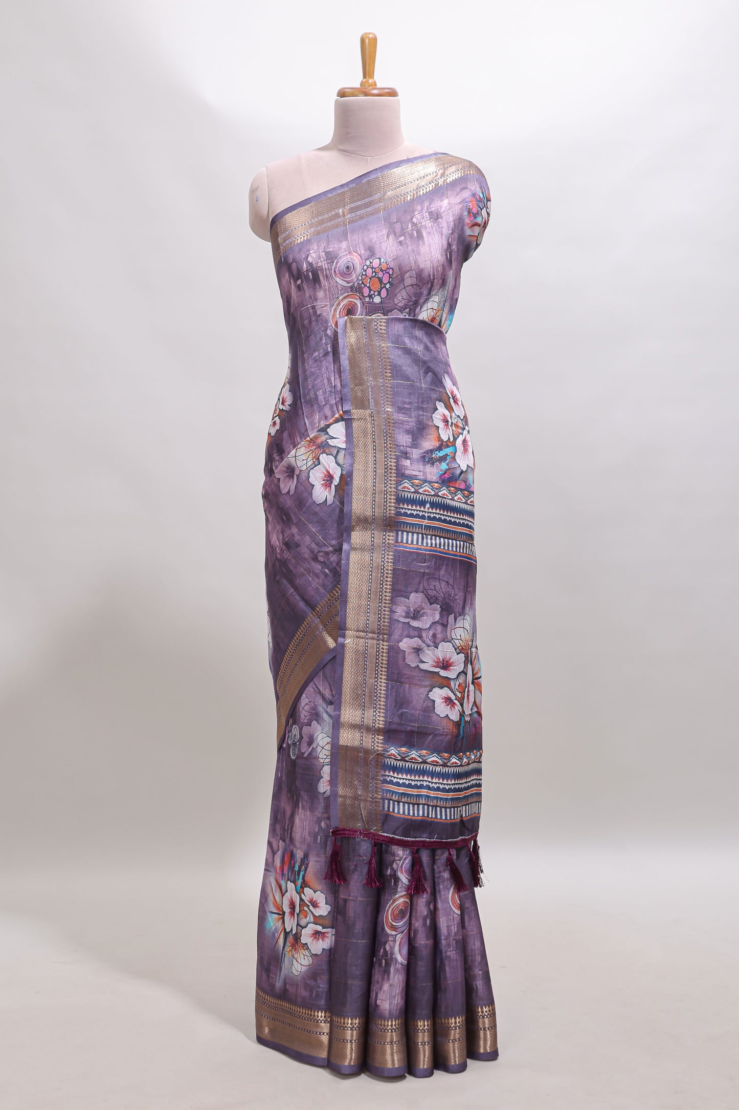 Lavender floral design dola silk saree with sellf zari border and matching blouse