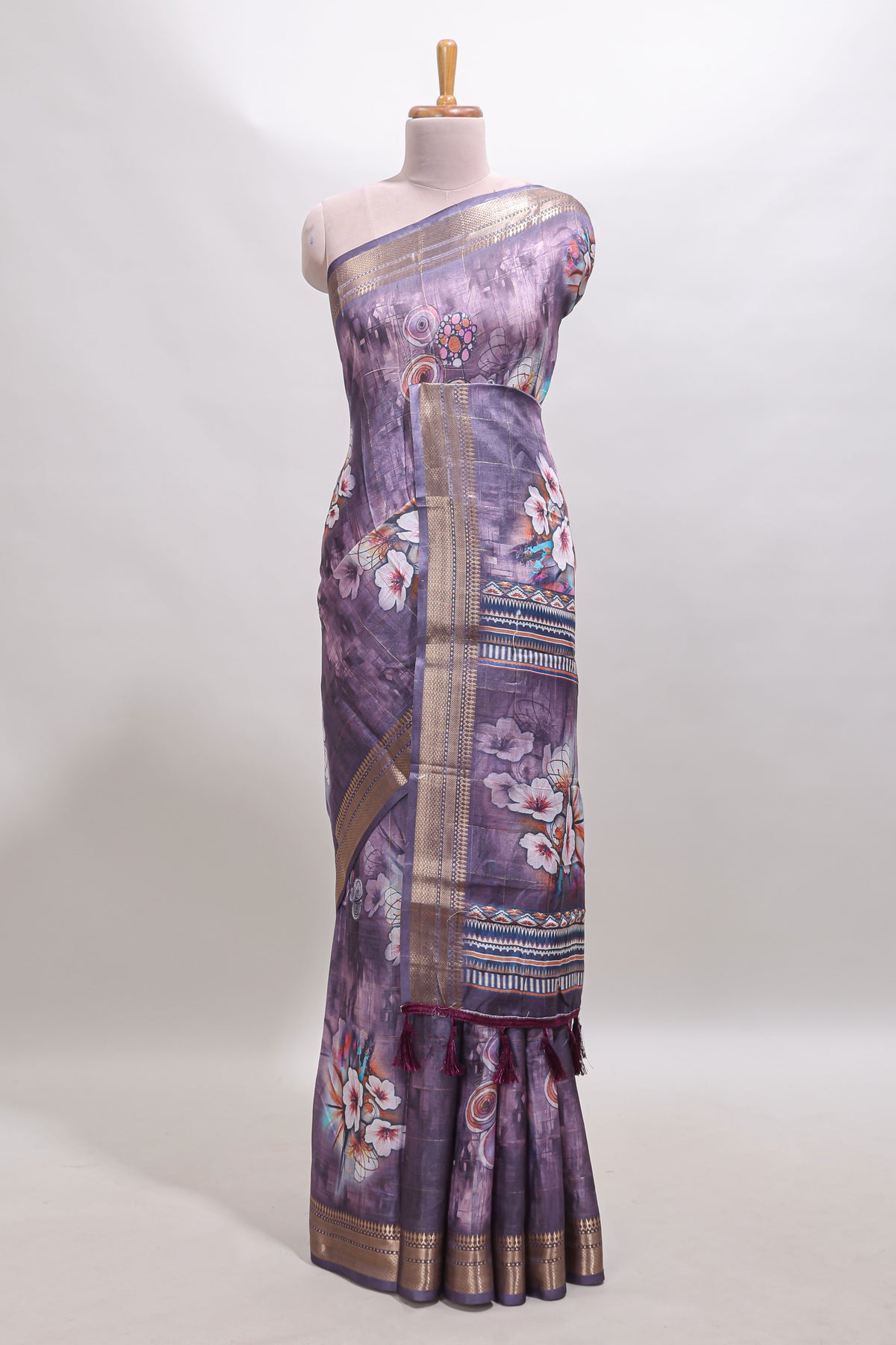 Lavender floral design dola silk saree with sellf zari border and matching blouse