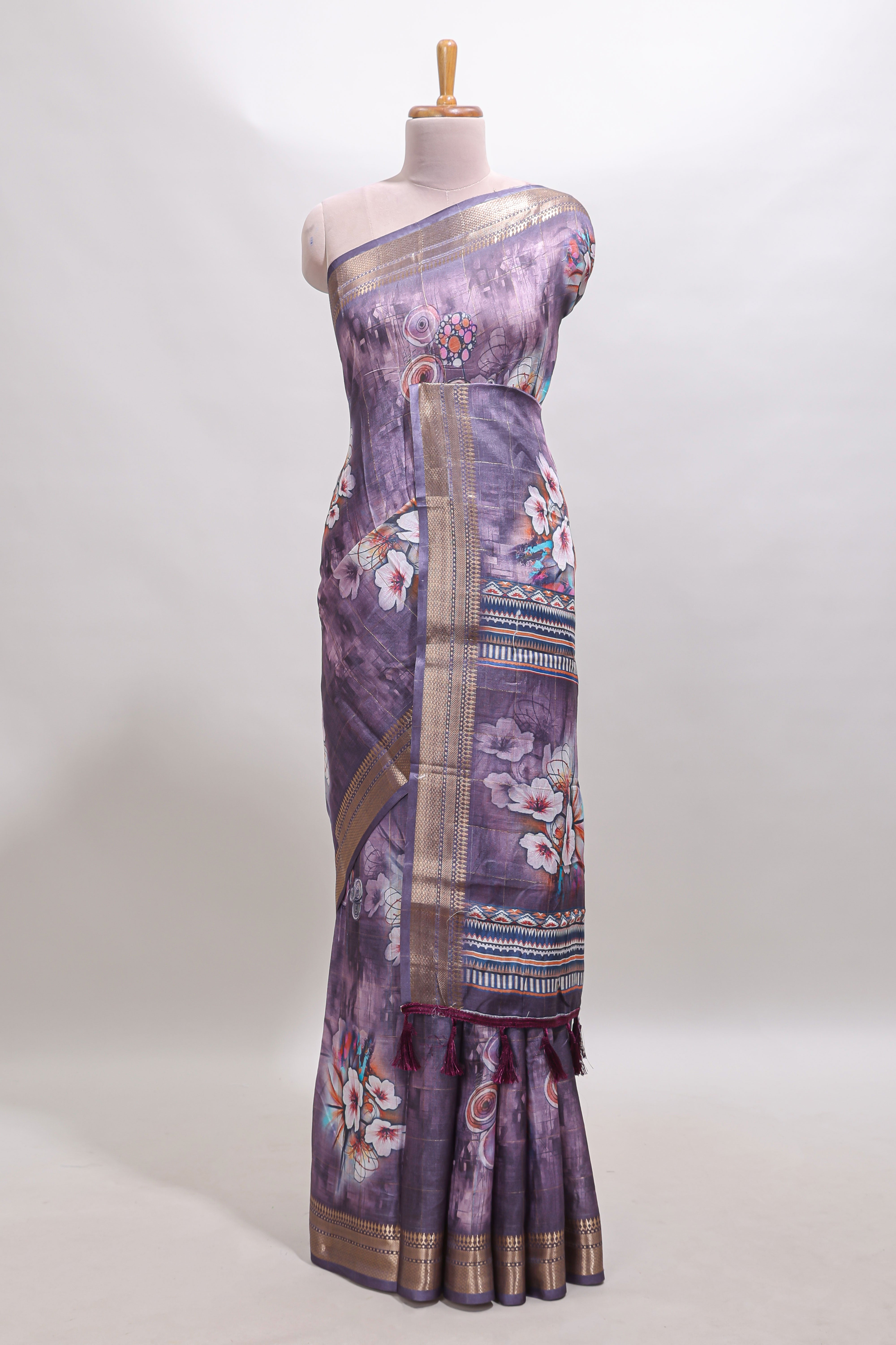 Lavender floral design dola silk saree with sellf zari border and matching blouse