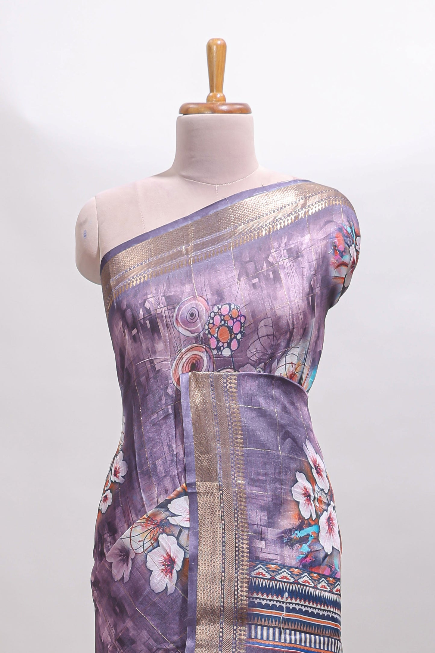 Lavender floral design dola silk saree with sellf zari border and matching blouse