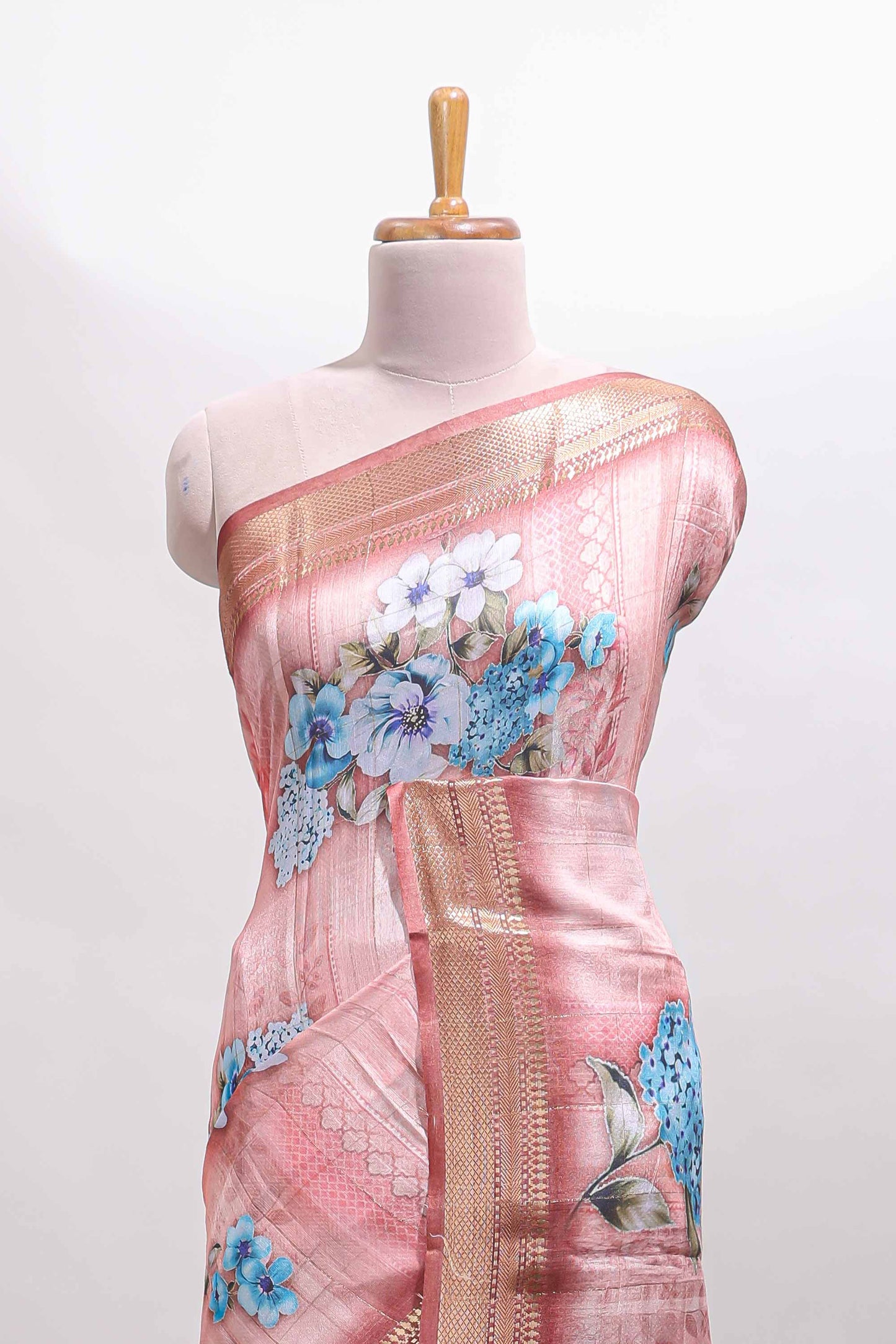 Peach floral design dola silk saree with sellf zari border and matching blouse