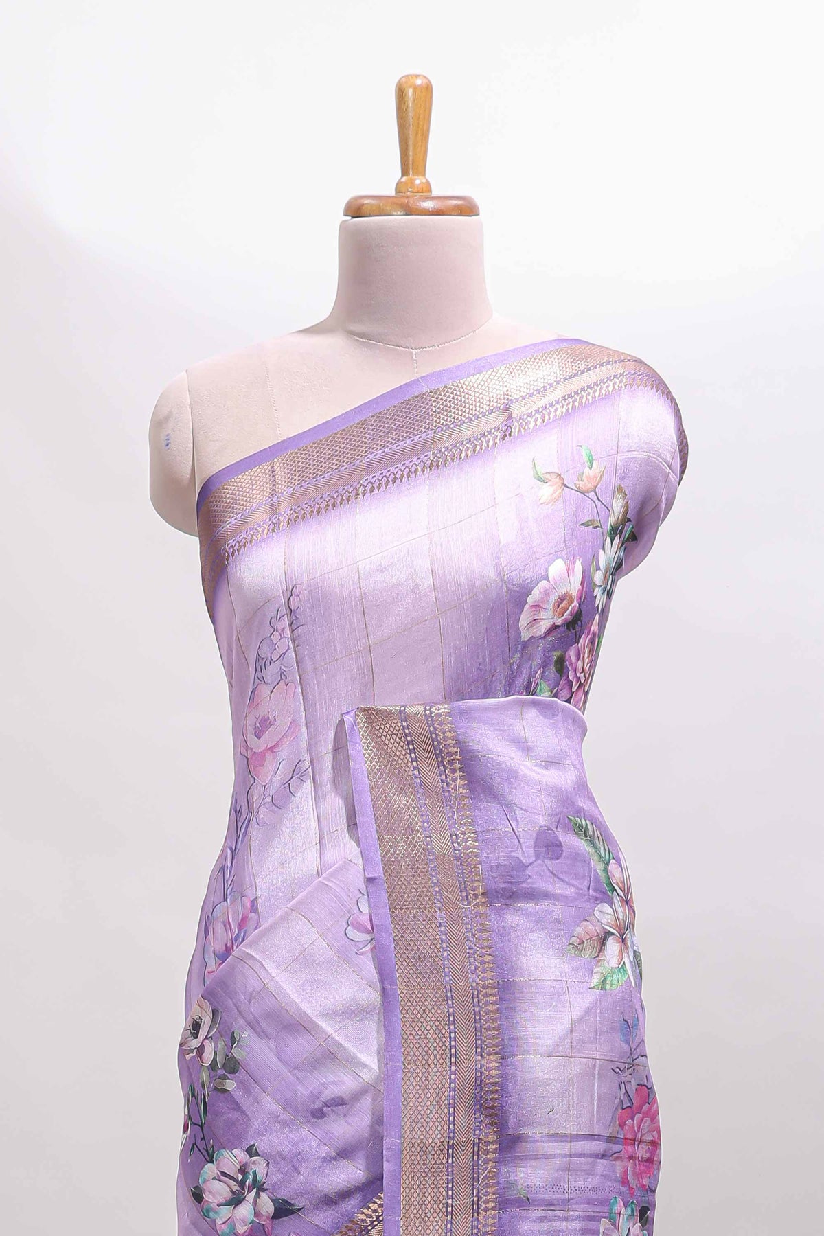 Lavender floral design dola silk saree with sellf zari border and matching blouse