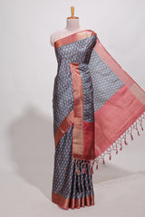 Steal blue dola silk saree with contrast coper gold zari border and contrast blouse