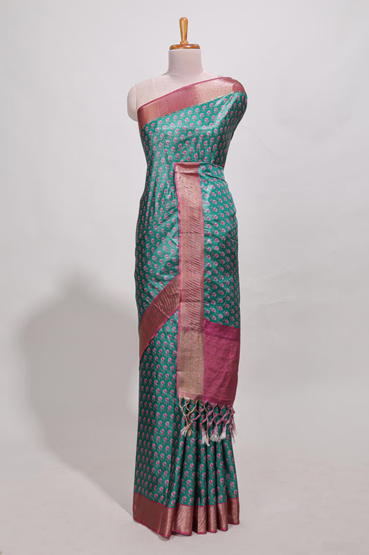 Bottle green dola silk saree with contrast coper gold zari border and contrast blouse