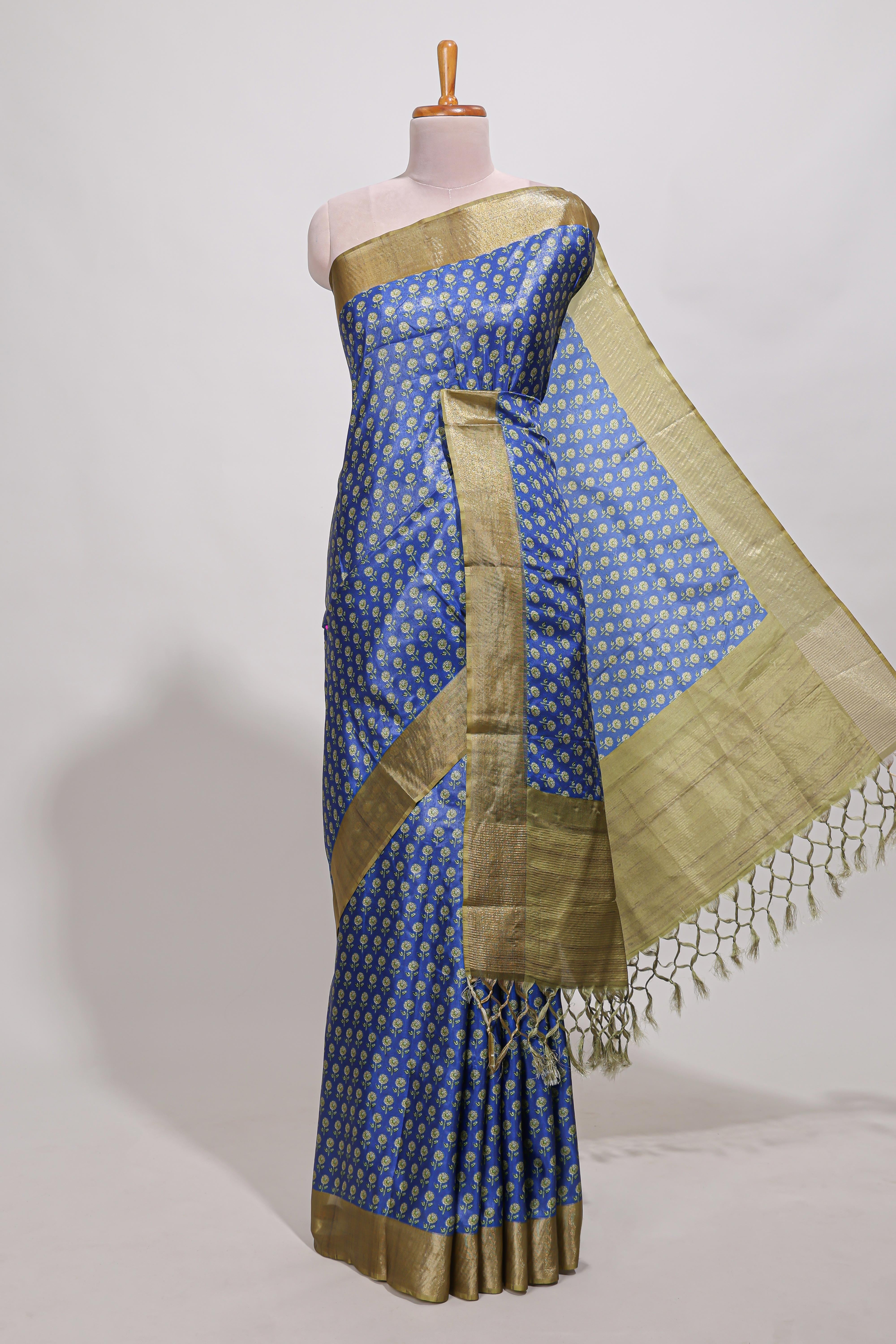 Blue dola silk saree with contrast coper gold zari border and contrast blouse