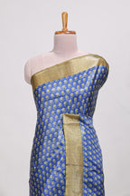 Blue dola silk saree with contrast coper gold zari border and contrast blouse