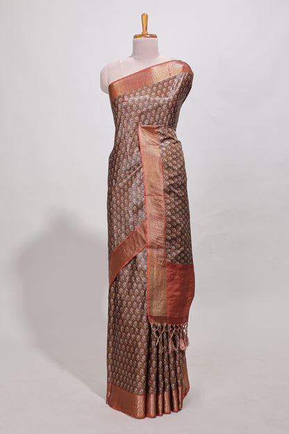 Brown dola silk saree with contrast coper gold zari border and contrast blouse
