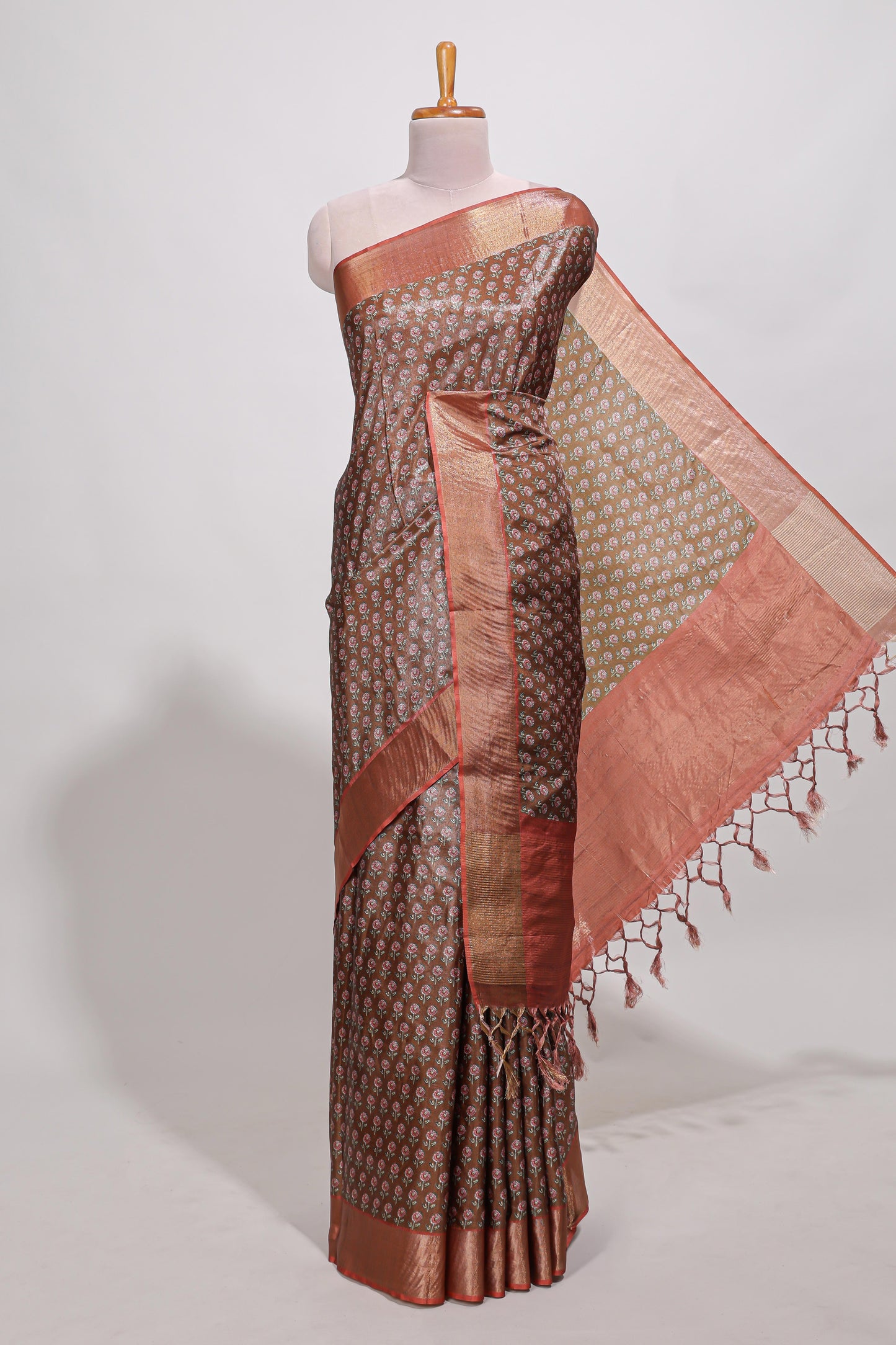 Brown dola silk saree with contrast coper gold zari border and contrast blouse