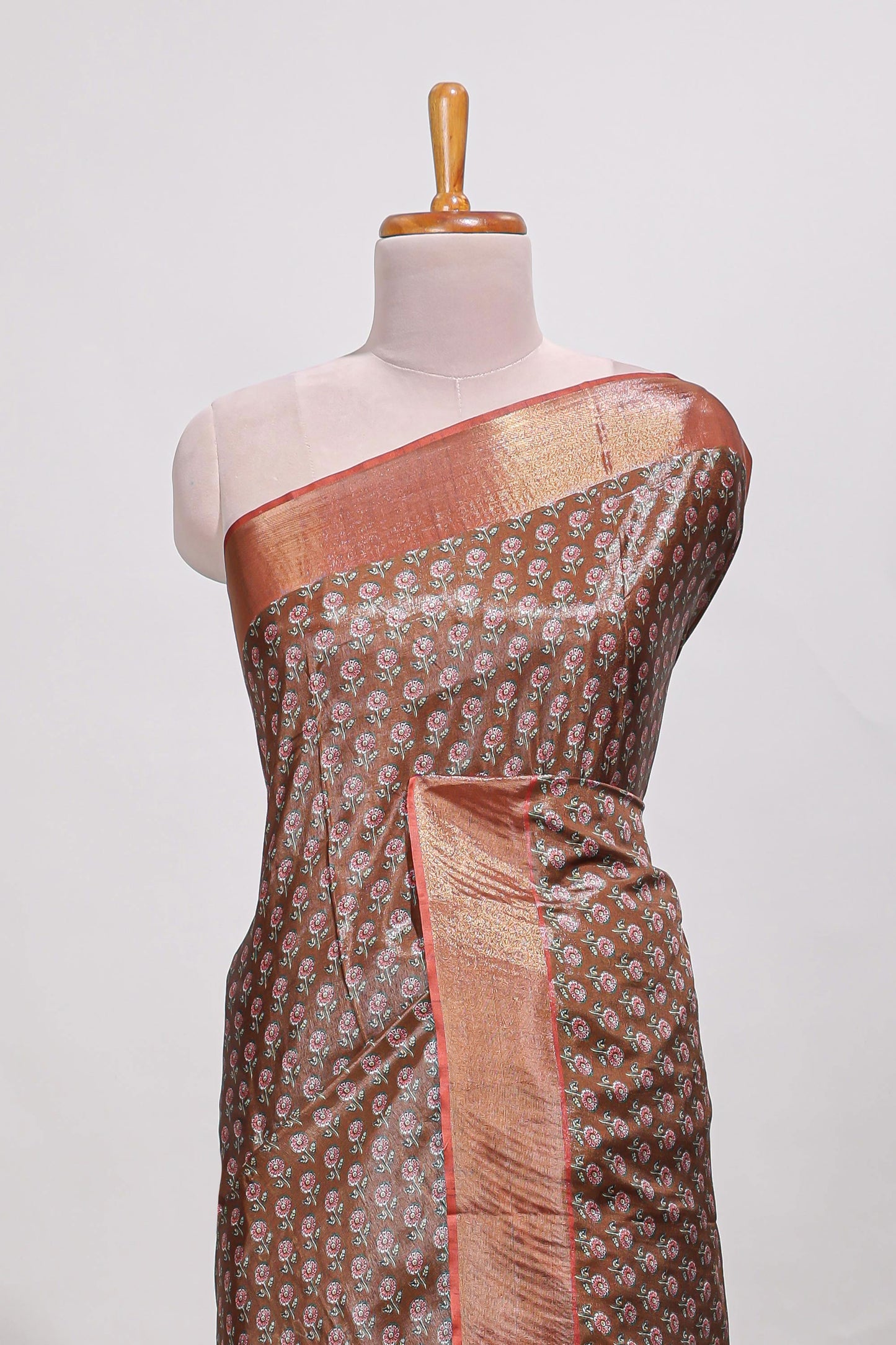 Brown dola silk saree with contrast coper gold zari border and contrast blouse