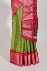 Green Dola silk saree all overzari workdesign with contrast zig zag border and contrast kalmkari printed pallu