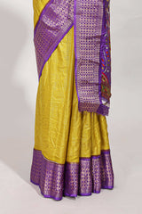 Dola silk saree all overzari workdesign with contrast zig zag border and contrast kalmkari printed pallu