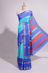 Turquoise green zari striped dola silk saree with contrast border and floral printed blouse