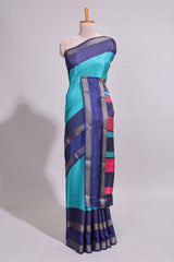 Turquoise green zari striped dola silk saree with contrast border and floral printed blouse