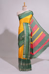 Yellow zari striped dola silk saree with contrast border and floral printed blouse