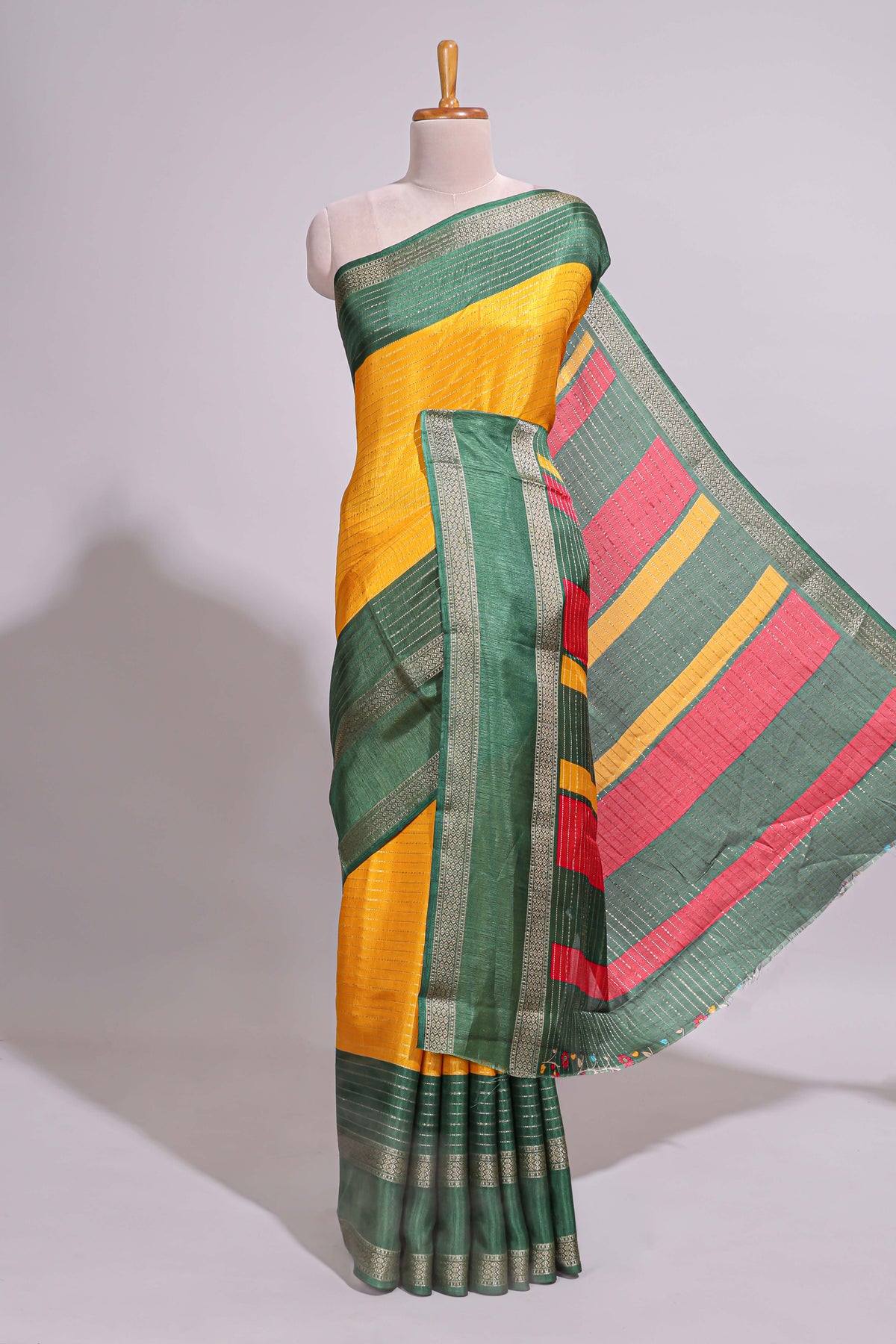Yellow zari striped dola silk saree with contrast border and floral printed blouse