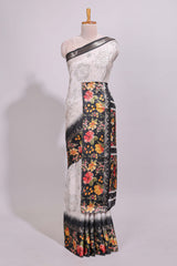 Off white floral design dola silk saree with contrast black border and printed motifs blouse