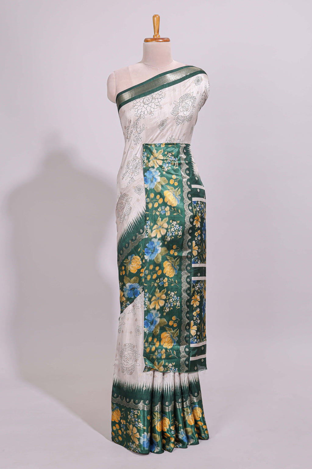 Off white floral design dola silk saree with contrast green border and printed motifs blouse