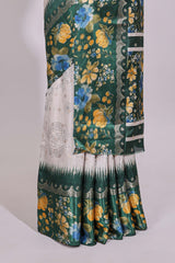Off white floral design dola silk saree with contrast green border and printed motifs blouse