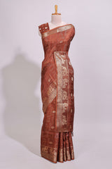 Rust brown striped elephant & bird zari butta dola silk saree with self zari border and matching zari motifs blouse