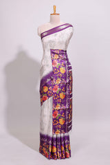 Off white floral design dola silk saree with contrast violet floral border and printed motifs blouse