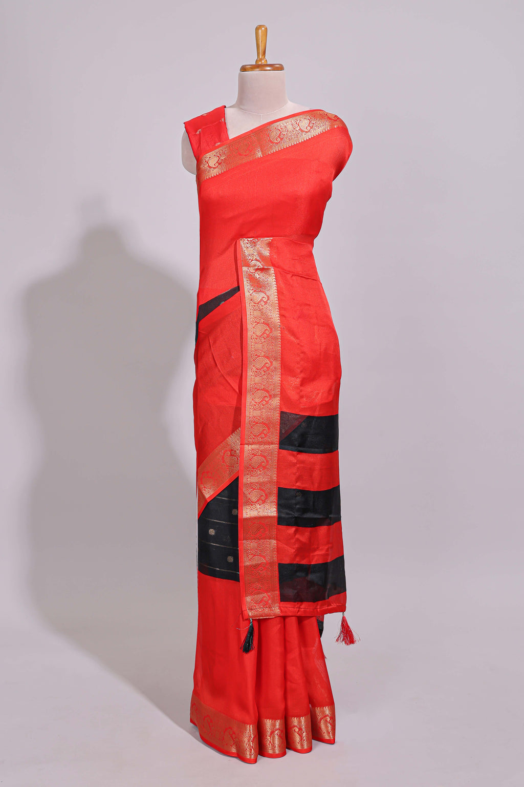 Black zari striped motifs dola silk saree with contrast red border and zari motifs blouse
