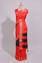 Black zari striped motifs dola silk saree with contrast red border and zari motifs blouse