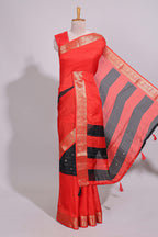 Black zari striped motifs dola silk saree with contrast red border and zari motifs blouse