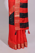 Black zari striped motifs dola silk saree with contrast red border and zari motifs blouse