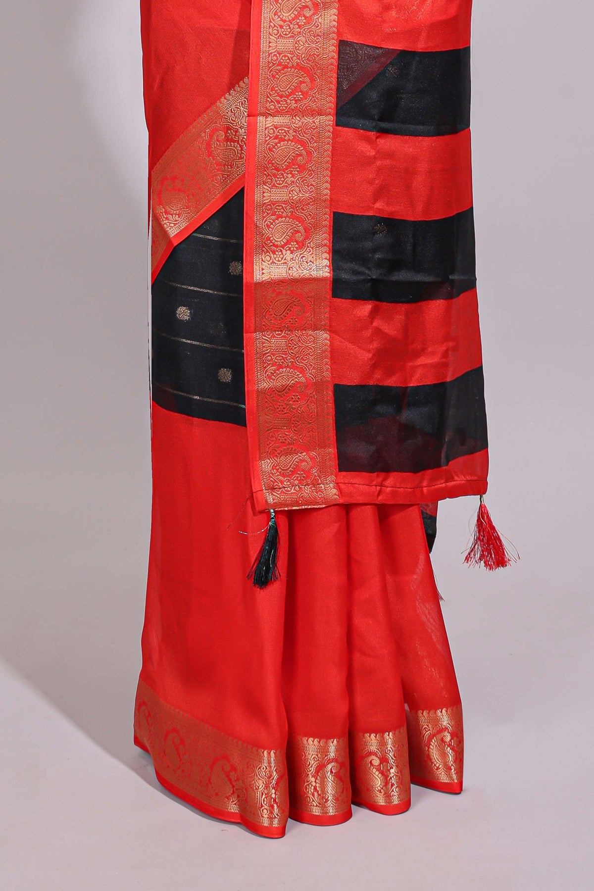 Black zari striped motifs dola silk saree with contrast red border and zari motifs blouse