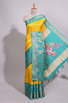 Yellow zari striped dola silk saree with contrast zari border and floral printed pallu