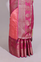 Peach zari striped dola silk saree with contrast zari border and floral printed pallu