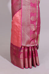 Peach zari striped dola silk saree with contrast zari border and floral printed pallu