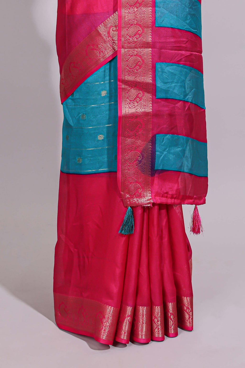 Turquoise blue zari striped motifs dola silk saree with contrast pink border and zari motifs blouse