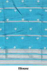 Teal blue Dola silk saree all over zari lines and motifs design with silver zariborder and self printed pallu and matching blouse