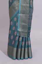 Peacock green zari butta dola silk saree with self zari border and matching zari motifs blouse