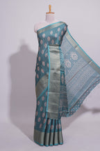 Peacock green zari butta dola silk saree with self zari border and matching zari motifs blouse
