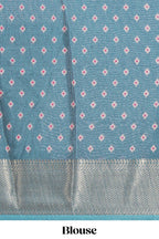 Peacock green zari butta dola silk saree with self zari border and matching zari motifs blouse