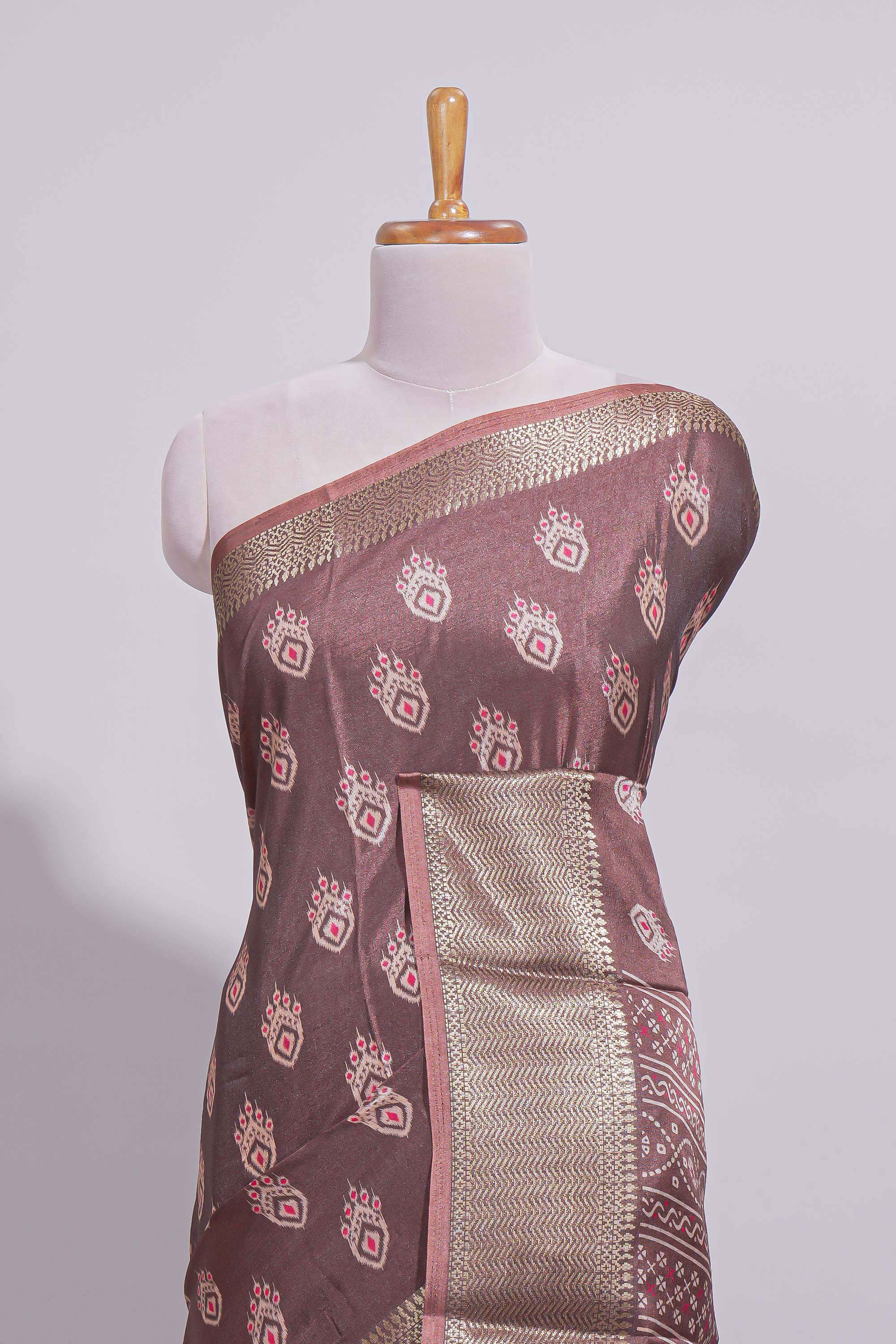 Browndola silk saree with all over butta self zari border and matching zari motifs blouse