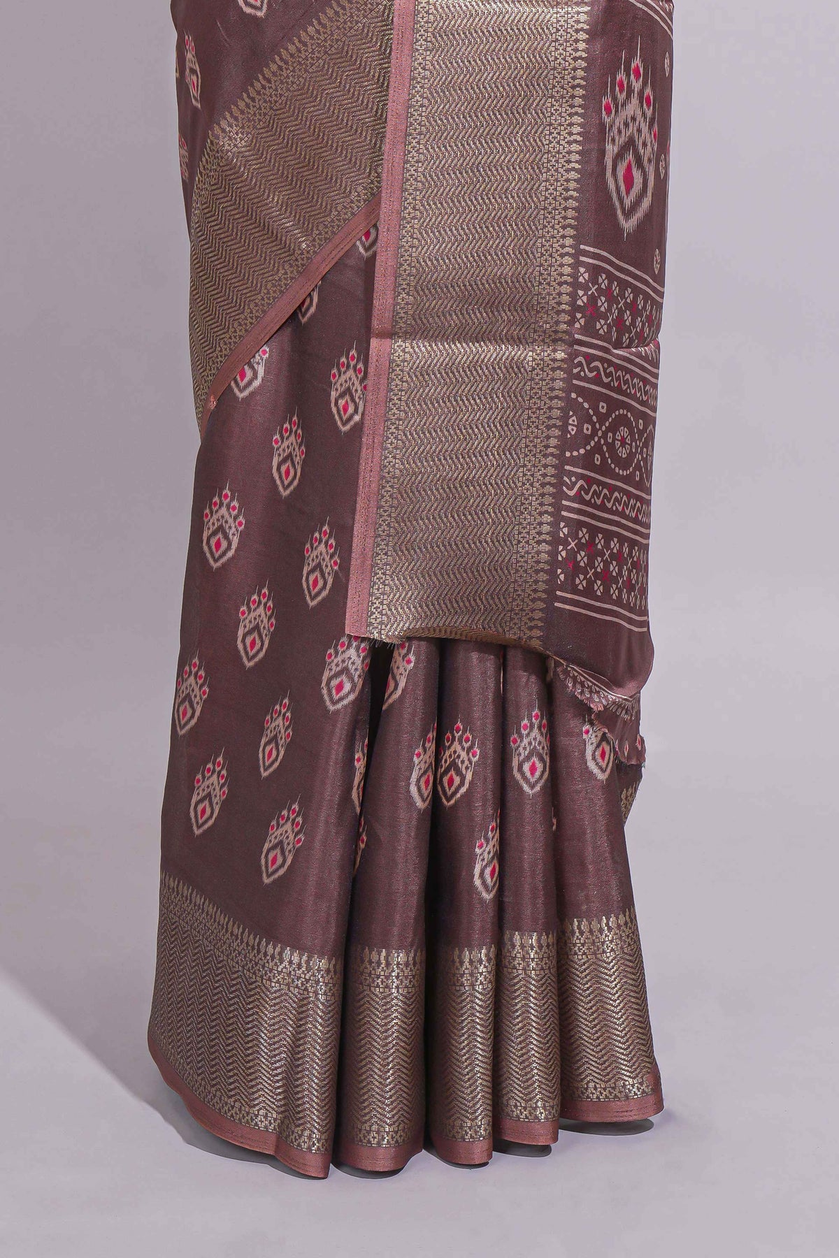 Brown dola silk saree with all over butta self zari border and matching zari motifs blouse
