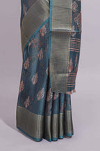 Pine green dola silk saree with all over butta self zari border and matching motifs blouse