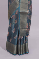 Pine green dola silk saree with all over butta self zari border and matching motifs blouse