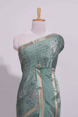 Teal green Dola Silk Saree all over floral motifs fine zari stripes and zari border with matching printed blouse