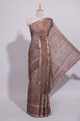 Brown Dola Silk Saree all over floral motifs fine zari stripes and zari border with matching printed blouse