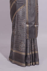 Charcoal Grey Dola Silk Saree all over floral motifs fine zari stripes and zari border with matching printed blouse