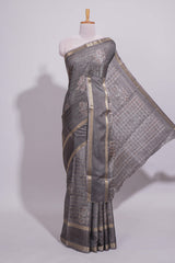 Charcoal Grey Dola Silk Saree all over floral motifs fine zari stripes and zari border with matching printed blouse