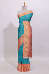 Teal blue striped dola Saree with contrast border and floral pallu along with contrast blouse