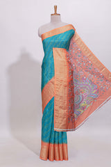 Teal blue striped dola Saree with contrast border and floral pallu along with contrast blouse
