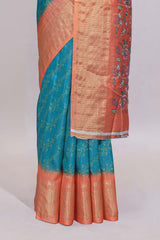 Teal blue striped dola Saree with contrast border and floral pallu along with contrast blouse