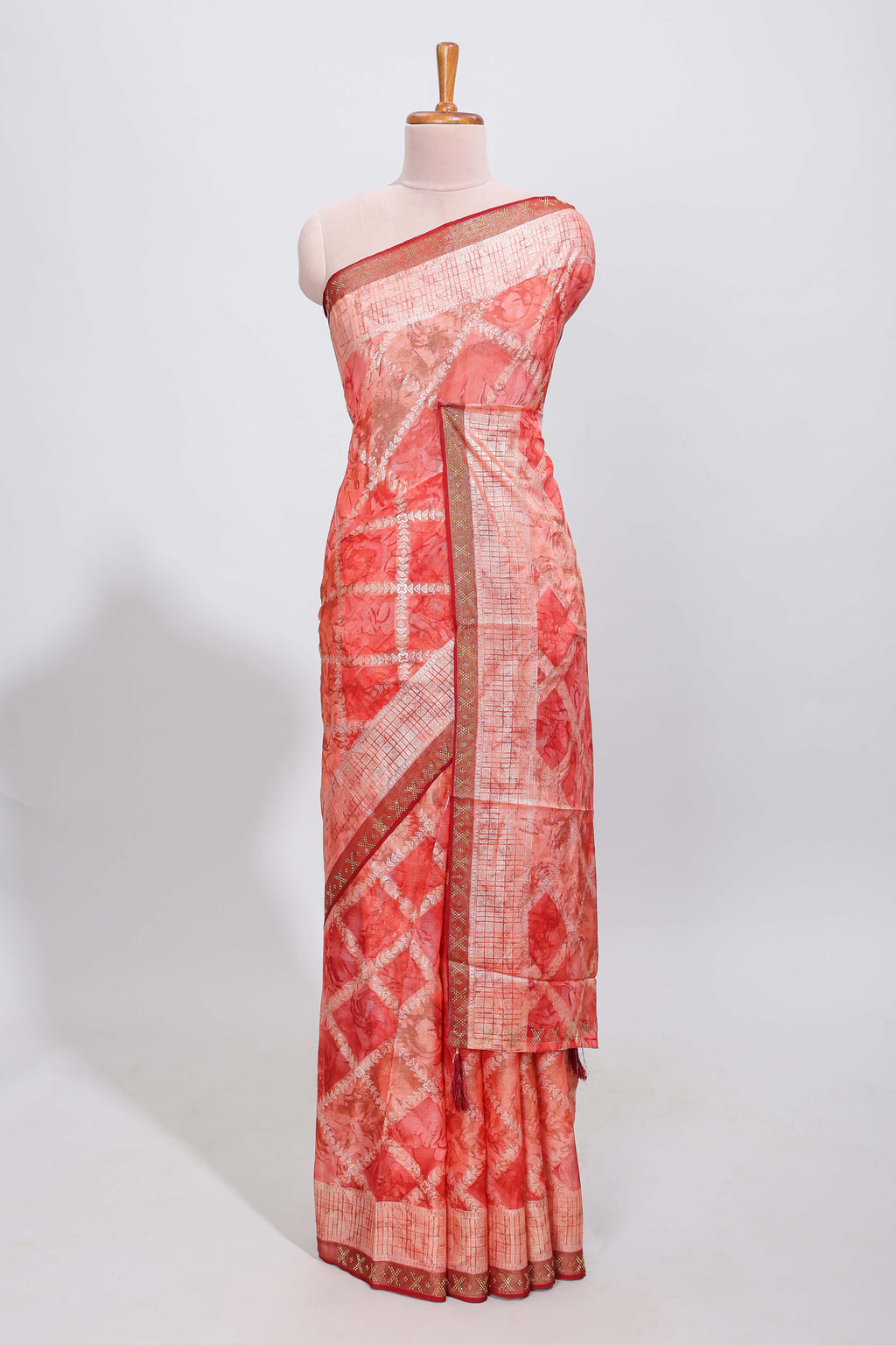 Orange checked floral theme dola silk saree with self border and matching blouse